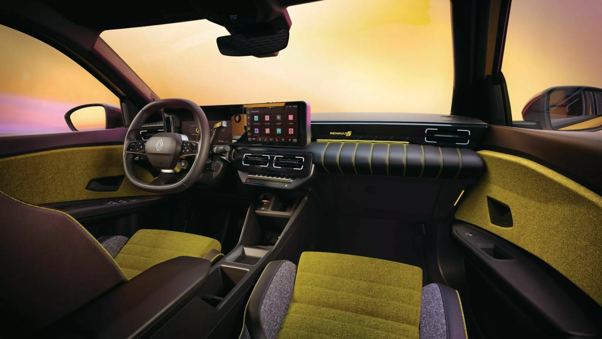 Interior del Renault 5 eléctrico - Diseño del habitáculo con pantalla táctil y elementos retro-modernos
